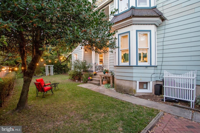 exterior space featuring a lawn