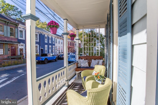 balcony featuring covered porch