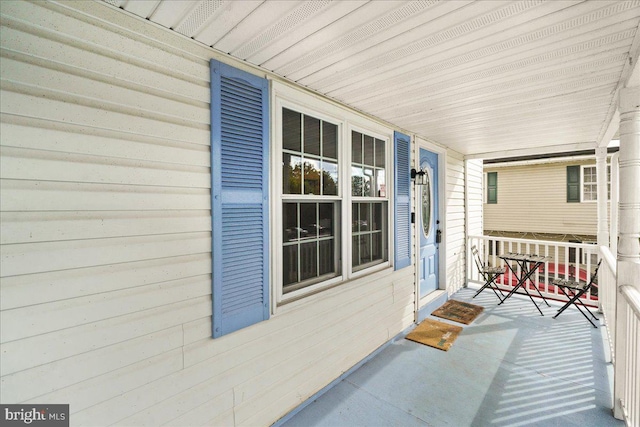 balcony featuring a porch