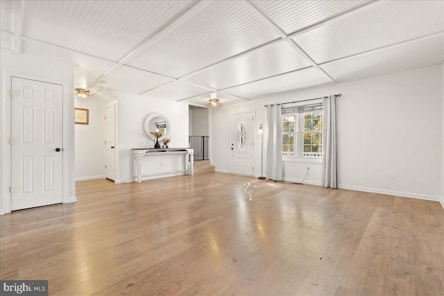 unfurnished living room with light hardwood / wood-style floors