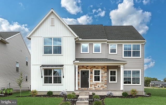 view of front of home featuring a porch and a front yard