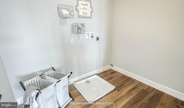 clothes washing area featuring hookup for a washing machine, wood-type flooring, and electric dryer hookup