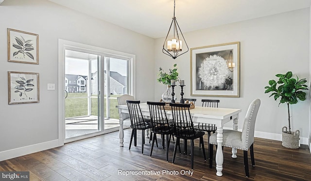 dining area with a notable chandelier, plenty of natural light, and dark wood-type flooring