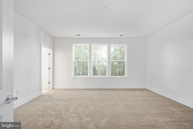 empty room with light carpet