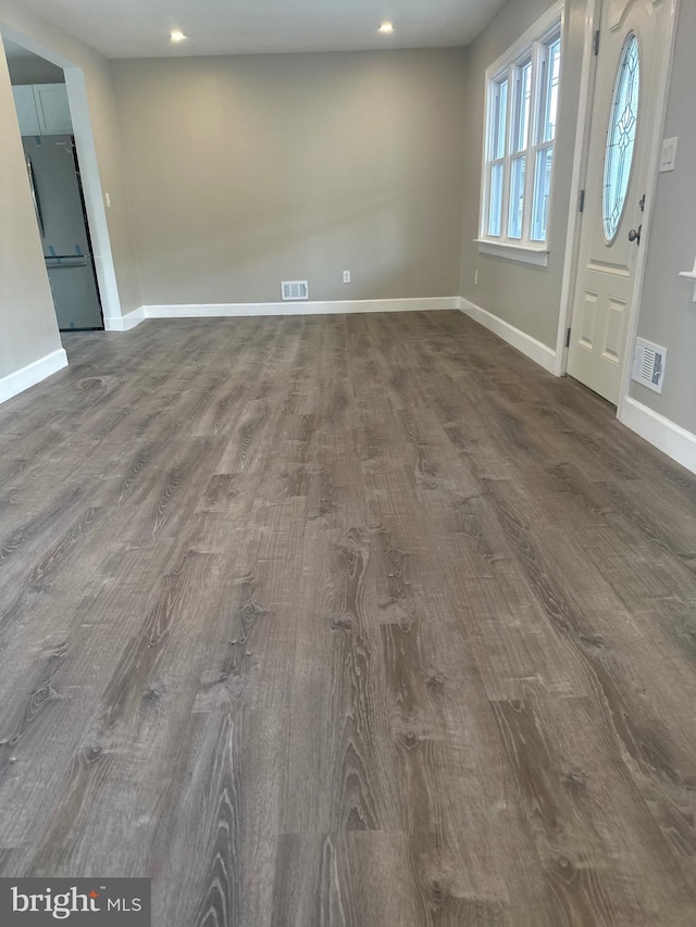 foyer featuring dark hardwood / wood-style floors