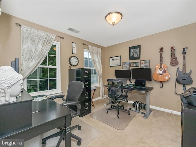 home office with light colored carpet