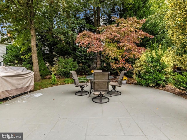 view of patio with a grill