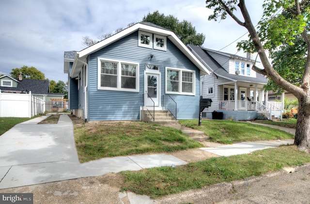 bungalow-style home with a porch