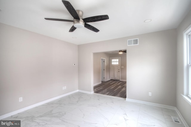 empty room with ceiling fan