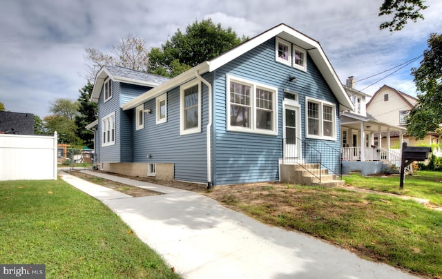 bungalow with a front yard