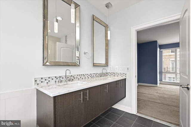 bathroom with tile patterned floors and vanity