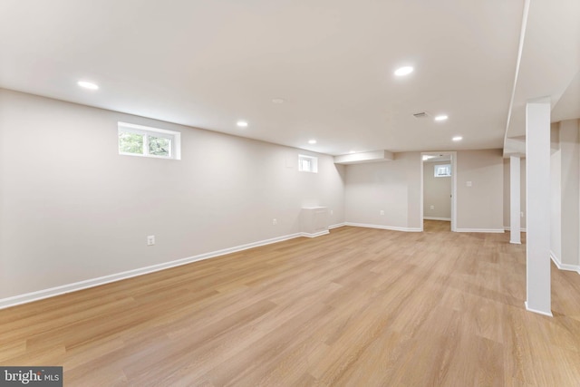 basement with light wood-type flooring