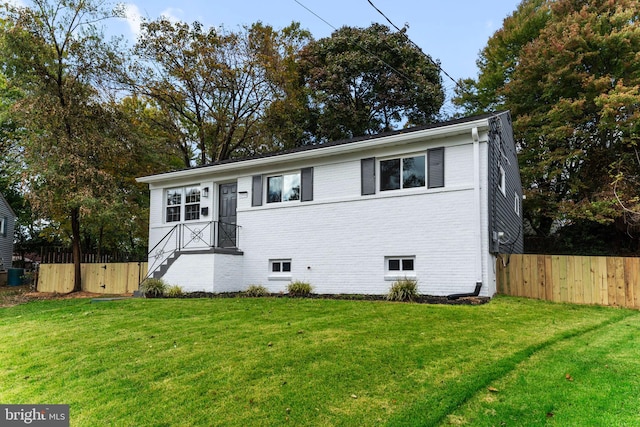 view of front of house with a front yard