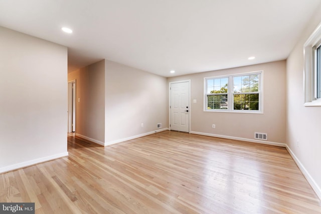 empty room featuring light hardwood / wood-style floors