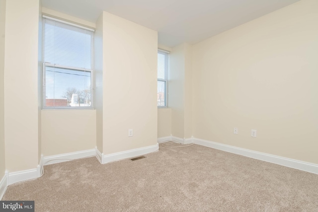 1121 Ward St, Baltimore, MD 21230 - spare room with light carpet