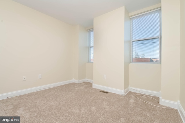 1121 Ward St, Baltimore, MD 21230 - carpeted empty room featuring baseboards