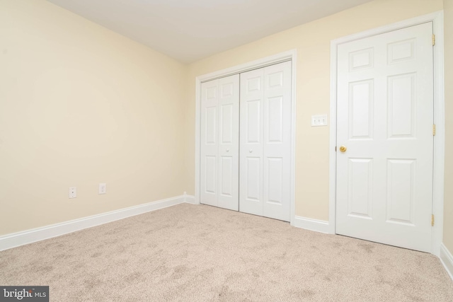 1121 Ward St, Baltimore, MD 21230 - unfurnished bedroom with carpet floors and a closet