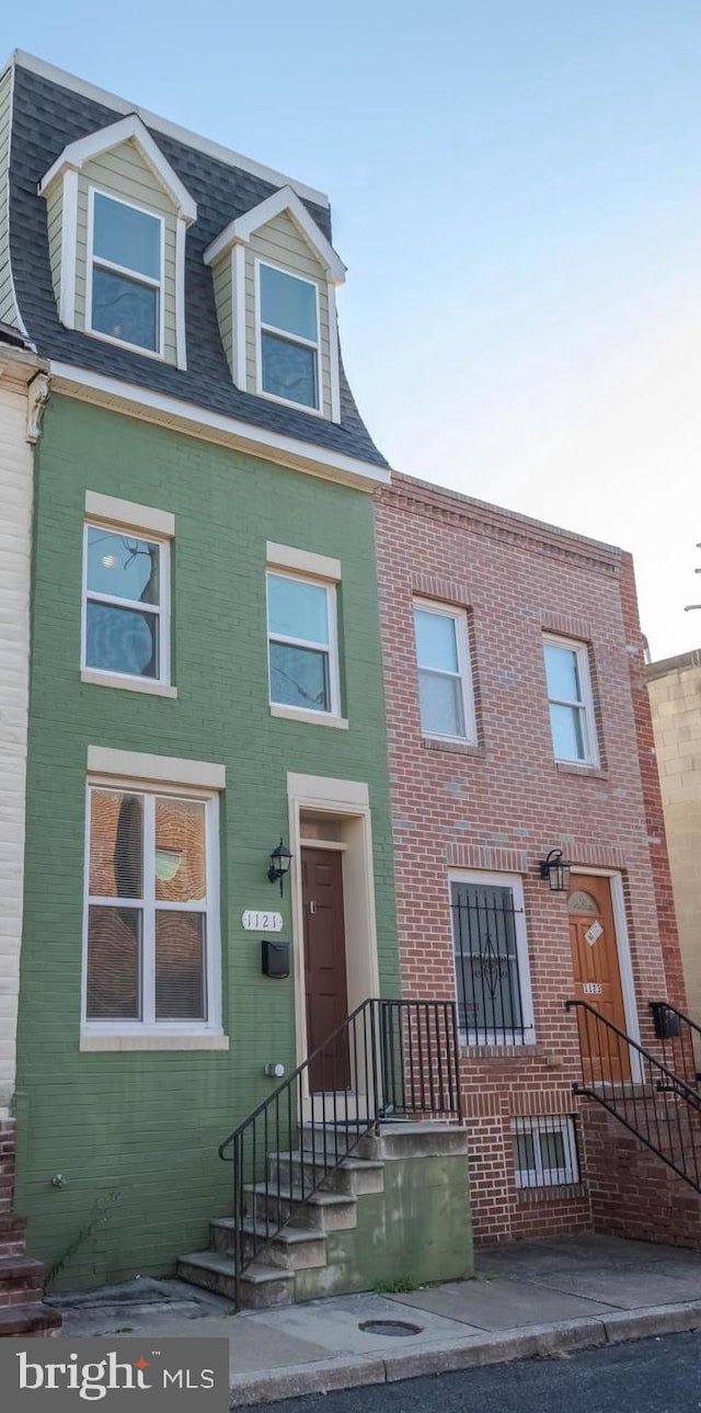 1121 Ward St, Baltimore, MD 21230 - view of front of home with brick siding
