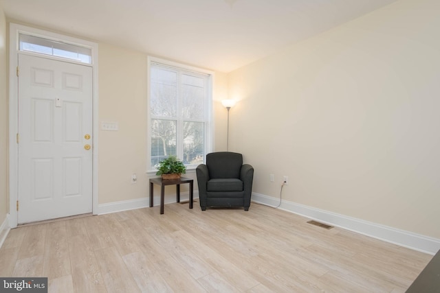 1121 Ward St, Baltimore, MD 21230 - entrance foyer with light wood finished floors and healthy amount of natural light