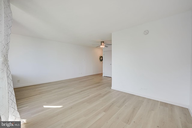 unfurnished room with light hardwood / wood-style floors and ceiling fan