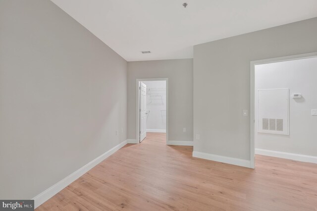 empty room with light wood-type flooring