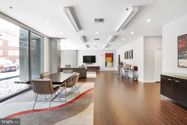 dining room with hardwood / wood-style floors