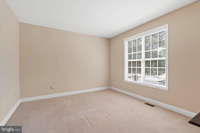 view of carpeted spare room