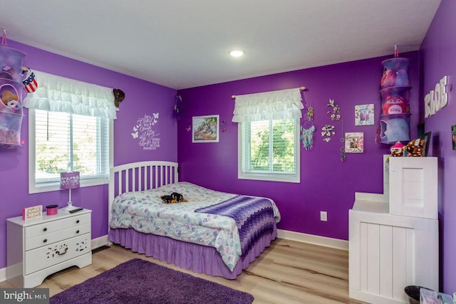 bedroom featuring light wood-type flooring