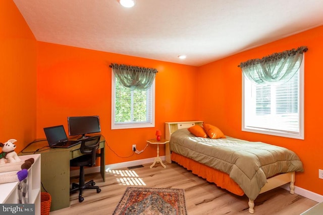 bedroom featuring light hardwood / wood-style flooring