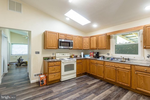 kitchen with ceiling fan, sink, dark hardwood / wood-style flooring, and white range with electric stovetop