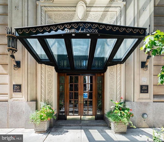 property entrance featuring french doors