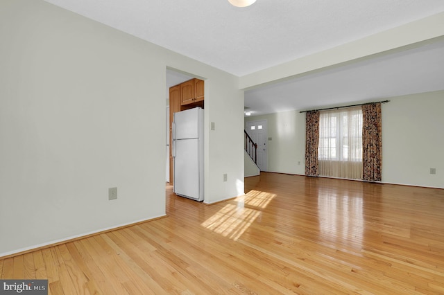 empty room featuring light hardwood / wood-style floors