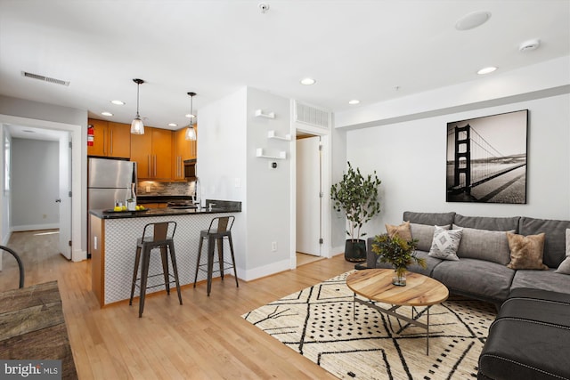 living room featuring light wood-type flooring