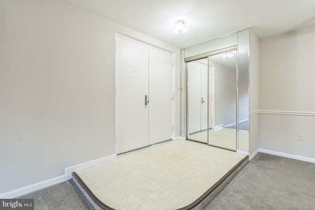 unfurnished bedroom featuring a closet