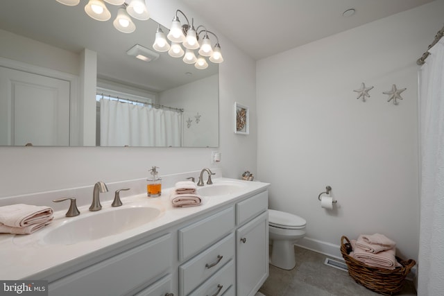 bathroom featuring vanity, toilet, tile patterned floors, and a shower with shower curtain