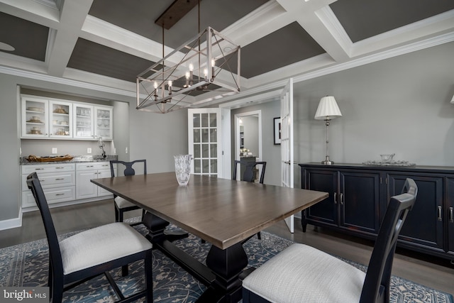 dining space featuring ornamental molding, beam ceiling, coffered ceiling, and dark hardwood / wood-style flooring