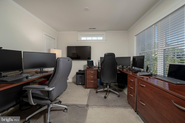 office area with light carpet and crown molding