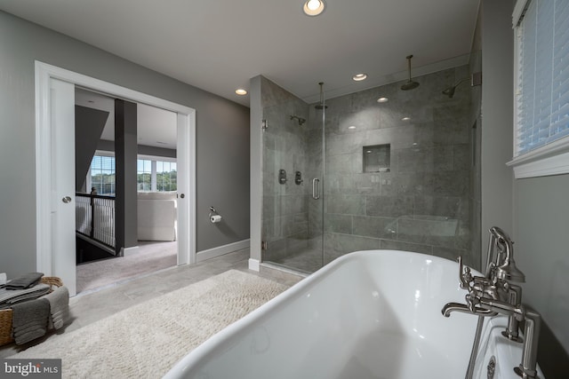 bathroom with independent shower and bath