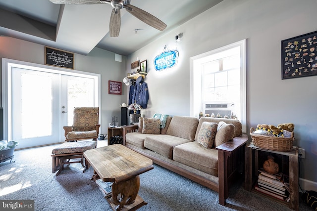 living room featuring ceiling fan, a healthy amount of sunlight, carpet, and cooling unit