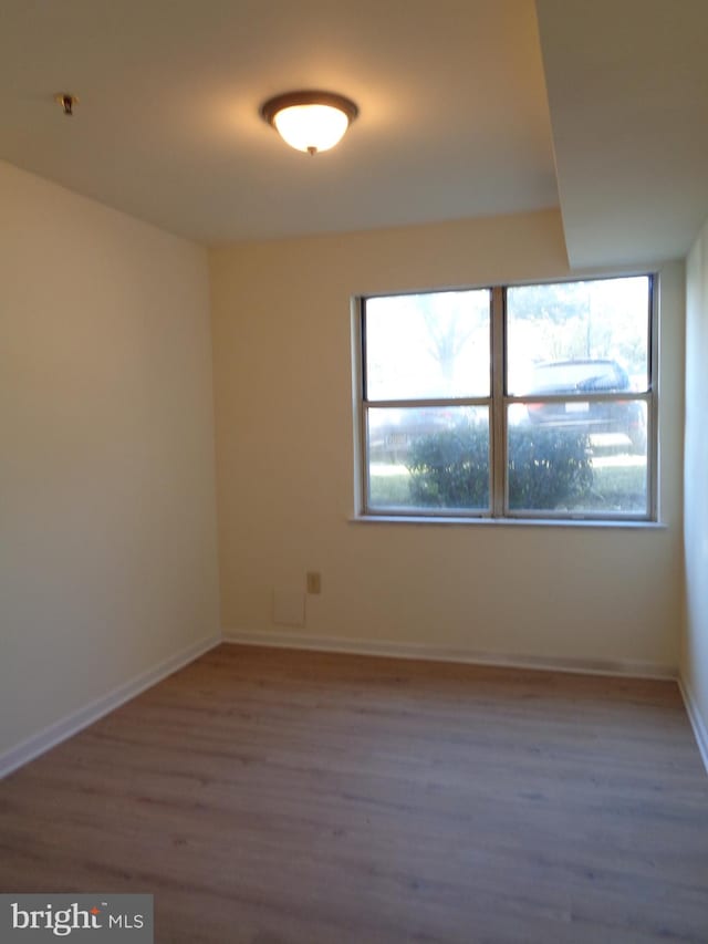 empty room featuring hardwood / wood-style floors