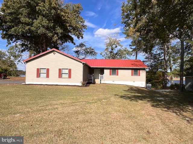 view of front facade with a front lawn