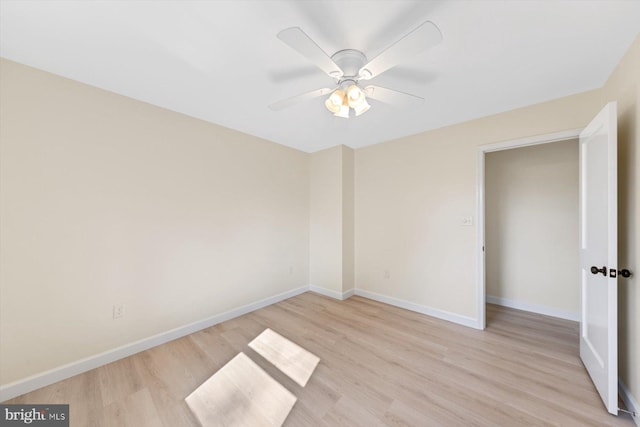 unfurnished bedroom with light hardwood / wood-style flooring and ceiling fan