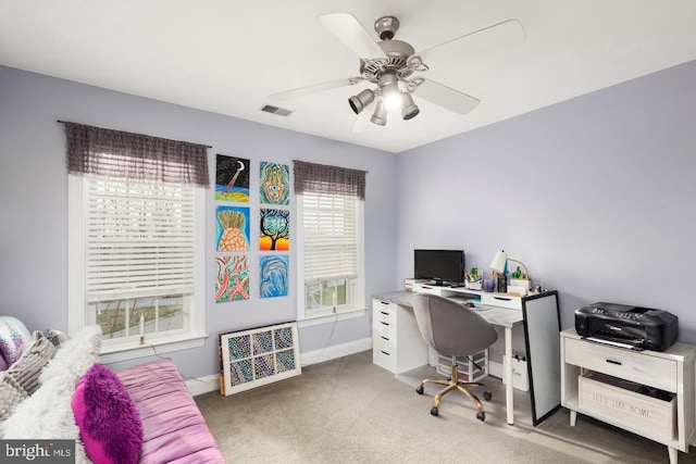 office featuring carpet and ceiling fan