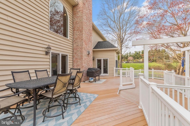 wooden terrace with grilling area