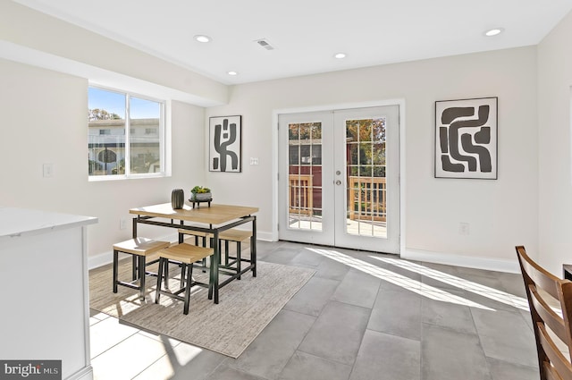 dining area featuring french doors