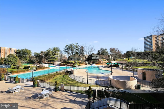 view of swimming pool featuring a patio