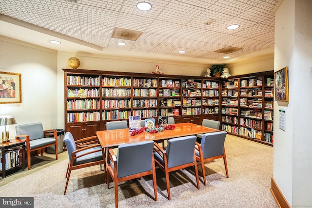 dining room with light carpet