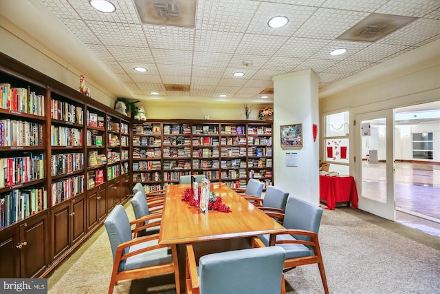 interior space featuring light colored carpet