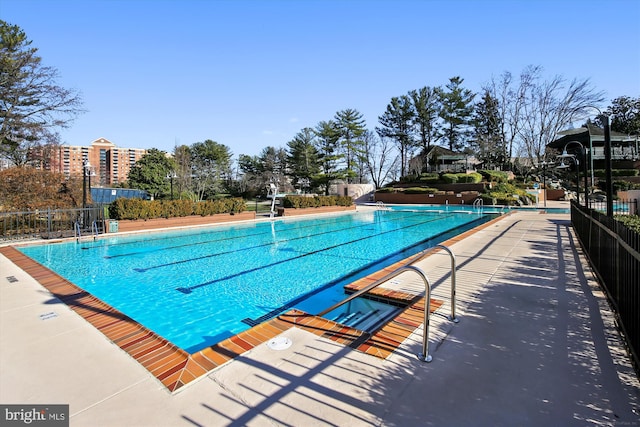 view of swimming pool featuring a patio