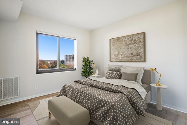 bedroom featuring hardwood / wood-style floors